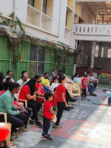 Parents cheering on the little athletes during Sports Day. We love creating a supportive community atmosphere where everyone feels involved.