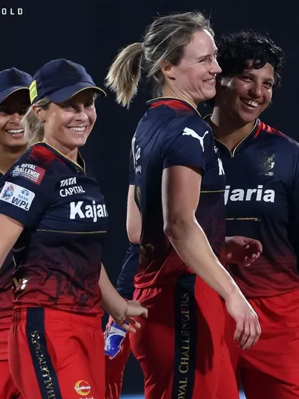 A duplicate of image 97, smiles after a crucial win.