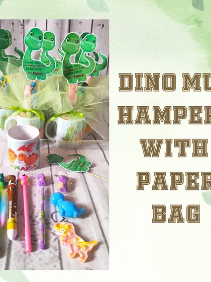 This image lays out all the fun items inside my dinosaur mug hampers, including the mug, assorted dino-themed stationery, and keychains.