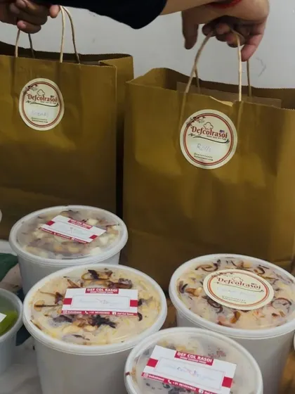 Our branded paper bags and sealed containers, ready for delivery. We provide the best home-cooked food in South Delhi, including party catering and combo meals.