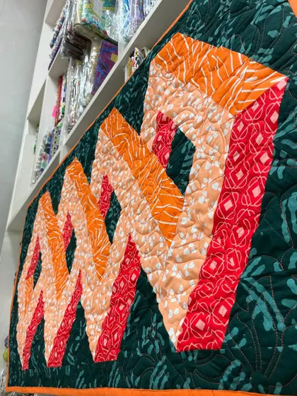 Another detail shot of the 3D quilt, showing the precise piecing and quilting.