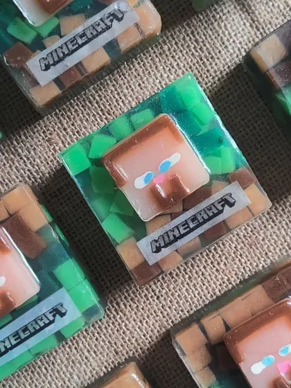 A detailed look at the Minecraft character soap. I use skin-safe colorants and a nourishing coconut oil base for all my themed soaps.