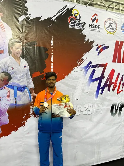 Harshit Pandey with his medal and certificate at the Thailand Open in Bangkok. Competing and winning at international events like this is a key part of our development strategy.