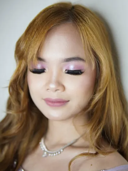 Another angle of the purple spotlight eye. This technique creates a beautiful halo effect that makes the eyes pop.