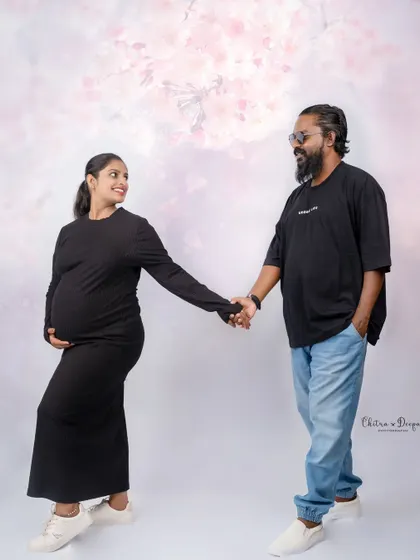 A casual and sweet moment. Even in simple matching black outfits, their connection and happiness shine through.