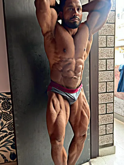 An abs and thigh pose. This is a classic pose to show midsection and leg detail.
