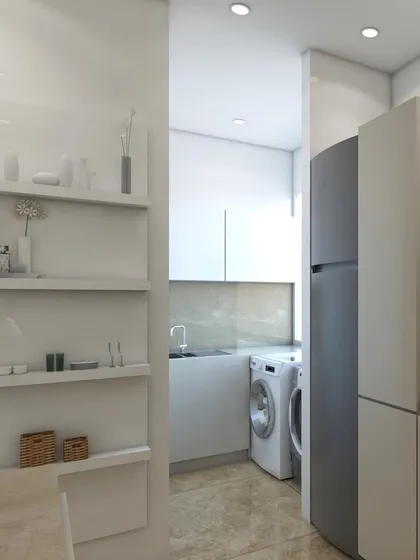 A look at a compact kitchen design where we incorporated all the essentials, including a bottle pullout unit and a grain trolley. We utilized the attached balcony as a wet area to make the kitchen feel larger and more efficient.
