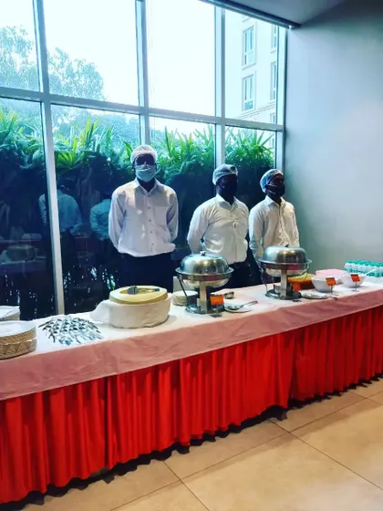 Our team ready to serve at a birthday party. We bring the same level of professionalism and care to every event, no matter the size.
