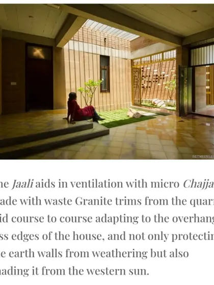 An interior court within the 'Breathe' residence blurs the line between inside and outside. The space brings light, air, and greenery into the core of the home, with a Jaali screen that aids natural ventilation and shades the earth walls from the western sun.