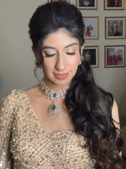 A close-up on this baby shower glam. The eyes have a soft, silvery shimmer, and the skin is dewy and radiant, creating a look that is both celebratory and sophisticated.