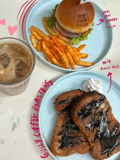 A perfect cafe meal at Gully Coffee Roasters. I used doodles to label the peri peri paneer burger and milo french toast, making it a helpful food review.