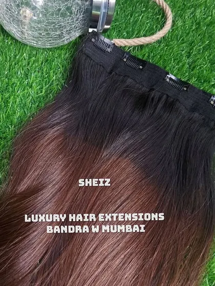 A beautiful ombre clip-on extension, transitioning from dark to light brown. We can create any custom color blend you desire.