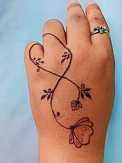 An infinity loop design with a floral twist. This is a simple, symbolic, and very trendy design that is perfect for any occasion.