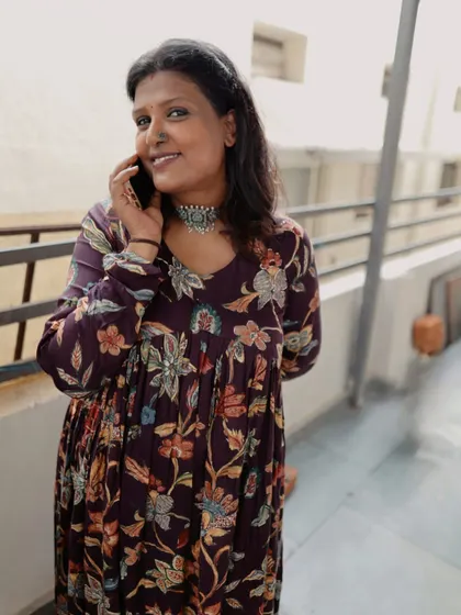 A quiet moment in one of my favorite custom-made dresses. This floral print tiered dress is comfortable, flowy, and perfect for any casual occasion. I love designing pieces that are both beautiful and easy to wear.