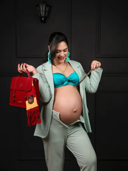 Expecting a little wizard? We love getting creative with themed photoshoots. This fun Harry Potter concept was a joy to bring to life for these fans.