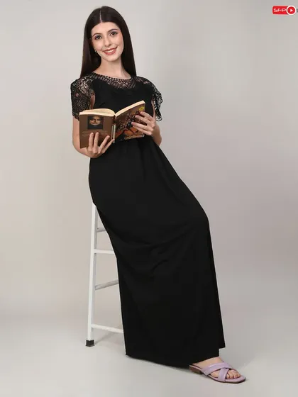 A lifestyle shot for the same nightgown, using a prop book to create a relaxed, comfortable mood. This helps customers connect emotionally with the product.