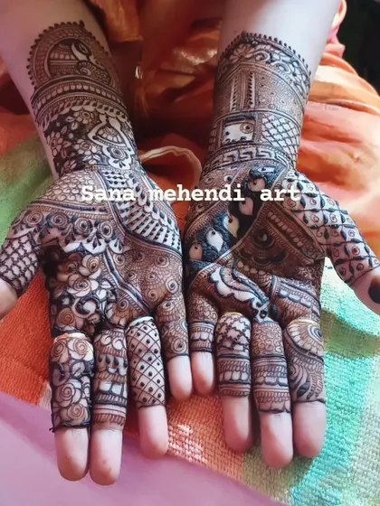 This design features a unique layout with penguins and elephants, showing how we can incorporate less traditional animals into a classic bridal format.