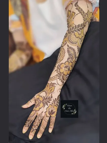 A full-sleeve design featuring a beautiful combination of floral and paisley patterns, creating a flowing and artistic look.