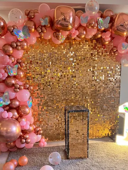 The shimmer wall catches the light beautifully, creating a dynamic and eye-catching background for any event.