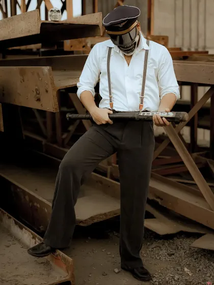 A different angle from the skull mask shoot, creating a more menacing and mysterious mood.
