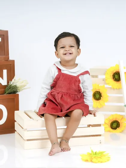Celebrating year two! This bright and cheerful sunflower-themed shoot is perfect for a toddler's second birthday.