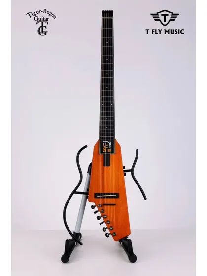 The Tiger Roger travel guitar, a compact and portable instrument that doesn't compromise on playability. Perfect for musicians on the go.