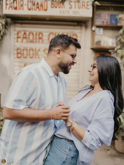 A joyful, candid moment between a couple outside a bookstore. Their genuine laughter is the centerpiece of this photo, showcasing my focus on capturing real emotions.