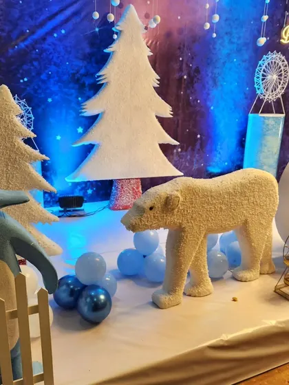 Detailed props like this textured polar bear and penguin help make the winter wonderland theme feel more realistic and immersive.