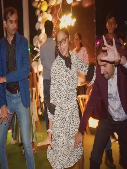 The birthday party continues with some fun and silly dancing. It's all about creating joyful memories.