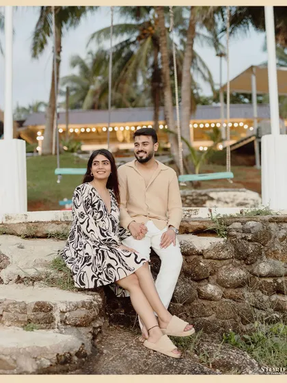 A lovely portrait of the couple sitting together at a beachside location in Ko Samui, sharing a quiet moment.