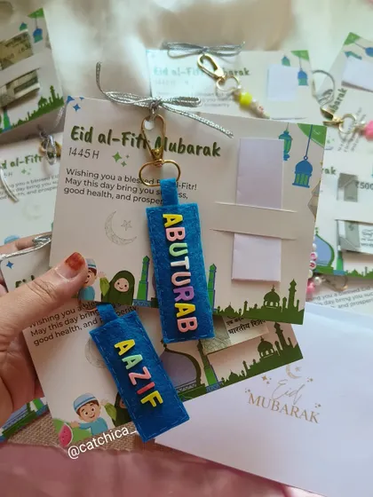 Celebrate Eid with us! Our Eidi card inserts can be paired with handmade customized keychains, like these felt name tags for Abuturab and Aazif.