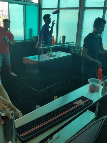 The academy is buzzing with energy as students get hands-on with flair practice. This is where passion for bartending comes to life.