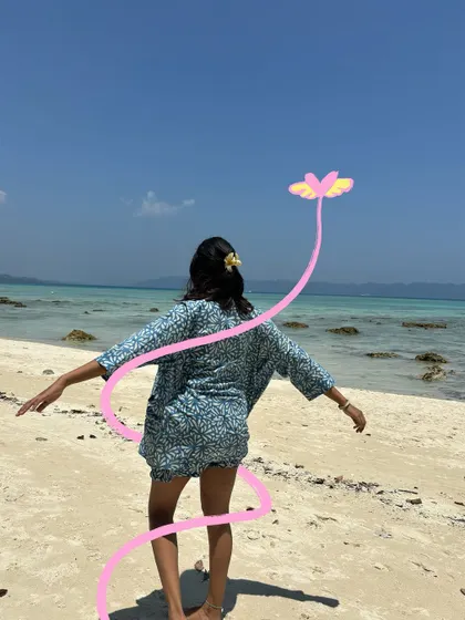 Another version of my "flying flower" doodle, adding a sense of whimsy and freedom to this beach photo.