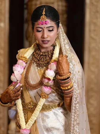 Additional views showcasing the variety and detail of my heirloom bridal sarees. Each image captures a different angle, moment, or detail, from full portraits to close ups of the fabric and embroidery, illustrating the complete story of each bride's custom creation.