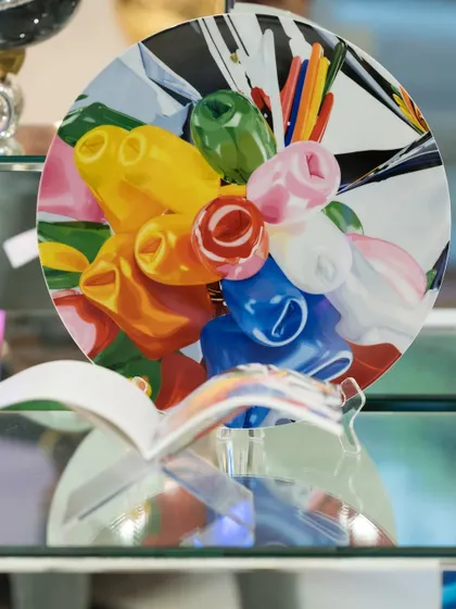 A closer look at the 'Tulips Coupe Plate' by Jeff Koons. The vibrant, balloon-like tulips are a signature of his style, now available exclusively at our gallery.