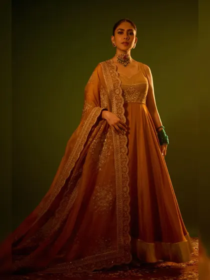The full, flowing silhouette of the custom Torani anarkali, a masterpiece of festive design.