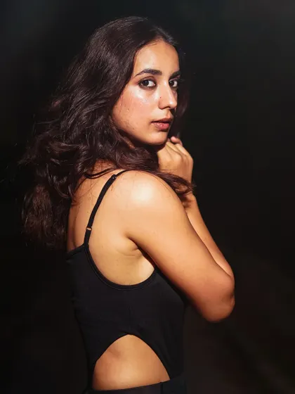 A moody and intense outdoor portrait. Using a flash at night can create this dramatic, "lost in the shadows" effect that I love.
