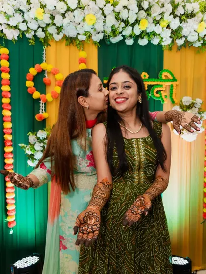A sweet kiss on the cheek from a friend or family member. These affectionate moments are a joy to photograph.