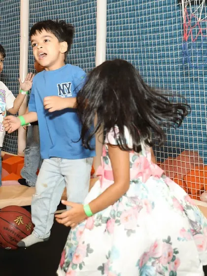Kids dancing and playing on the trampoline, a great way to burn off that party energy.