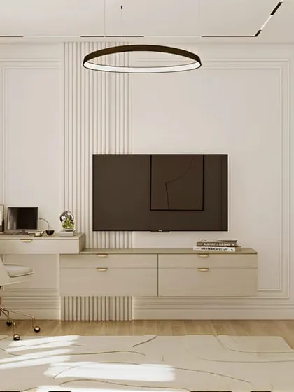A similar concept of an integrated TV and desk unit, this time in a lighter color palette. The floating design keeps the floor clear and makes the room feel larger.