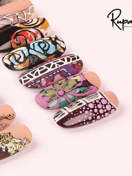 A close-up of the intricate designs from my advanced foil nail art course.