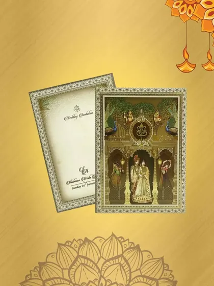 This ivory box invitation card features a couple on the envelope and a Ganesha sticker. It comes with two colorful inserts for your event details.