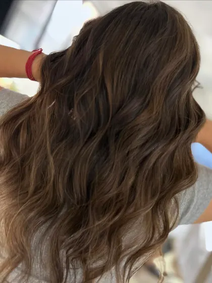 This no-bleach, two-tone highlight blend is a fantastic way to get a fresh look while keeping your hair super healthy. The classic full-head highlights add beautiful dimension.