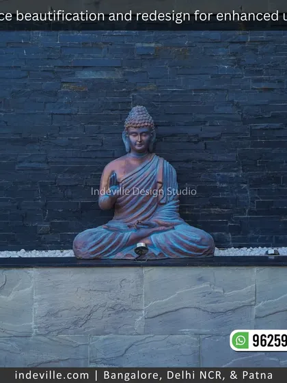 The centerpiece of a serene terrace: a meditating Buddha statue set against a cascading water wall. This feature adds a tranquil and spiritual element to the outdoor living space.