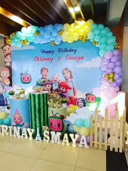 A sweet Cocomelon theme for twins Shrinay and Samaya's first birthday. We created a beautiful backdrop with a pastel balloon arch and included plenty of character cutouts to celebrate the special day for two.
