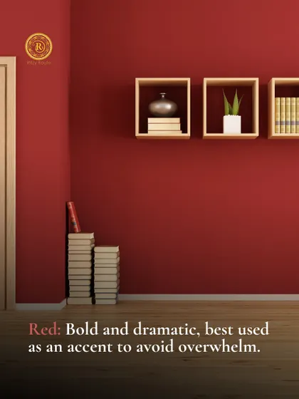 Red is bold and dramatic, best used as an accent to avoid overwhelming a space. A room with a deep red accent wall.