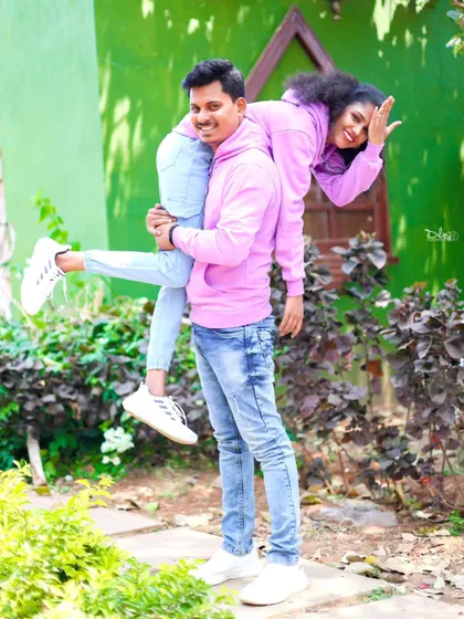 A fun and energetic shot with the groom giving his partner a playful lift. I love capturing these spontaneous, happy moments.