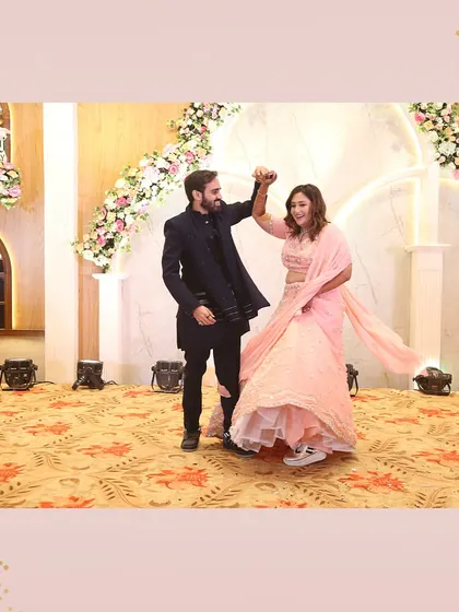 Capturing twirls in the majestic backdrop of magnificent florals, as if dancing in a dream. Our events are a symphony of beauty and love.