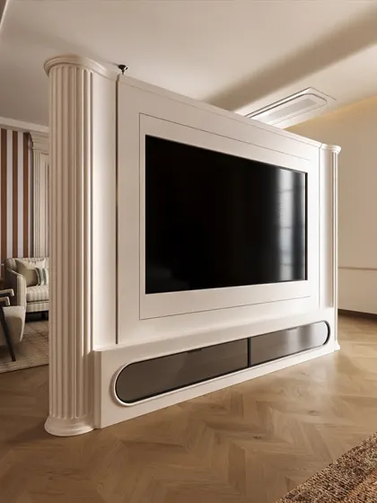 The floating TV unit is supported by a fluted classical column, seamlessly integrating this modern feature into the room's overall neoclassical aesthetic. It's a detail that shows our commitment to cohesive, thoughtful design.