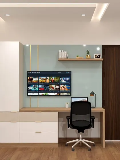 A wider view of the dressing and study combination unit. It shows how the TV can be mounted above the desk, creating a multi-functional wall that serves work, beauty, and entertainment needs.